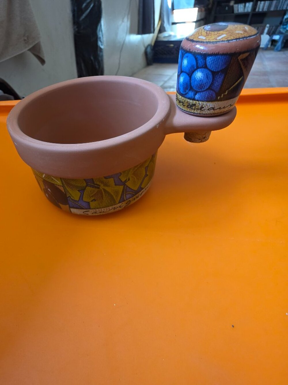 clay pot wine bottle holder with decorative wine bottle cork and holder